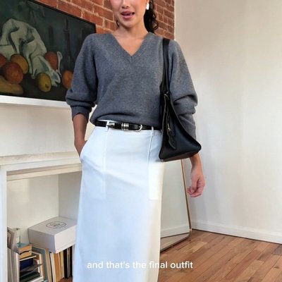 @judyxkam styles our Back Slit Midi Skirt in White with our Wool V Neck Sweater in Grey