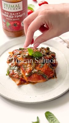 Tuscan Salmon in less than 30 minutes! SAVE this for a quick dinner or for hosting!

Ingredients:
4 salmon fillets
Salt and pepper, to taste
Primal Kitchen Avocado Oil
3 cloves garlic, minced
1/2 cup sundried tomatoes, chopped
3 packed cups baby spinach
Primal Kitchen Sundried Tomato Pasta Sauce
1/4 cup full-fat canned coconut milk
Fresh chopped basil, for garnish

Directions:
1. Pat the salmon fillets dry with paper towels and season the tops with salt and pepper.
2. Heat 1 tablespoon of avocado oil in a large 10-inch skillet over medium heat. Add the salmon fillets, skin side down, and sear for 3-4 minutes on each side until golden brown and just cooked through. Remove from the skillet and set aside on a plate.
3. Turn heat to low and in the same skillet, add the remaining 1 teaspoon of avocado oil. Add garlic, sundried tomatoes, and spinach and sauté for 1 minute until spinach is wilted.
4. Skim the cream off the top of the coconut milk. Stir in the Sundried Tomato Pasta Sauce and coconut milk to the skillet. Mix well.
5. Make a little well and return the salmon fillets to the skillet. Add lid on top and cook on low for 4-5 minutes to let the flavors meld.
6. Garnish with fresh basil, if desired, and serve hot.

pick up the new Sundried Tomato Sauce at Whole Foods on on primalkitchen.com!