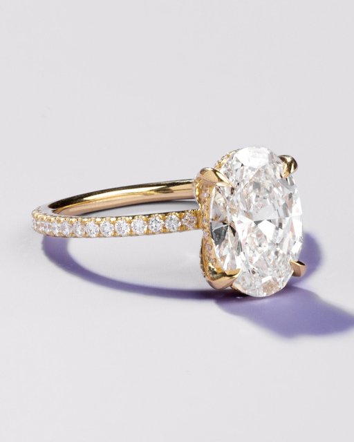 The Luxe Viviana is one of our best-selling rings for these reasons... 

The Setting Details: 
💍 Stacks flush with almost any wedding band  
💍 Scalloped Pavé Diamonds for extra sparkle 
💍 Extra security with a diamond gallery