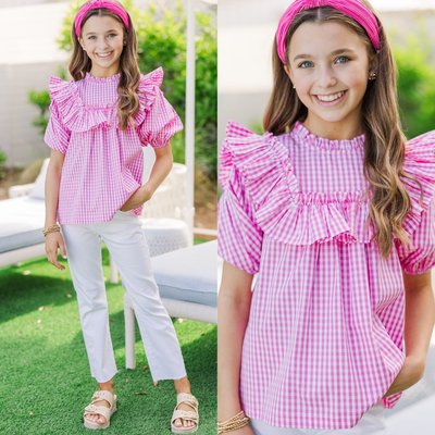 Gingham + ruffles = her summer style must-have! Cute for lunch dates, playdates, and everything in between! 💕🍓

$38 >> Girls: Make Your Choices Pink Gingham Ruffled Blouse 

#cutetweenoutfits #tweenclothes #southernboutique #girlstyleinspo #momsoftweens #tweenboutique #MintGirls