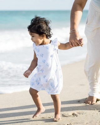 Reminder to slow down and soak it all in 🌊 The giggles, the sunshine and the little toes in the sand #burtsbeesbaby