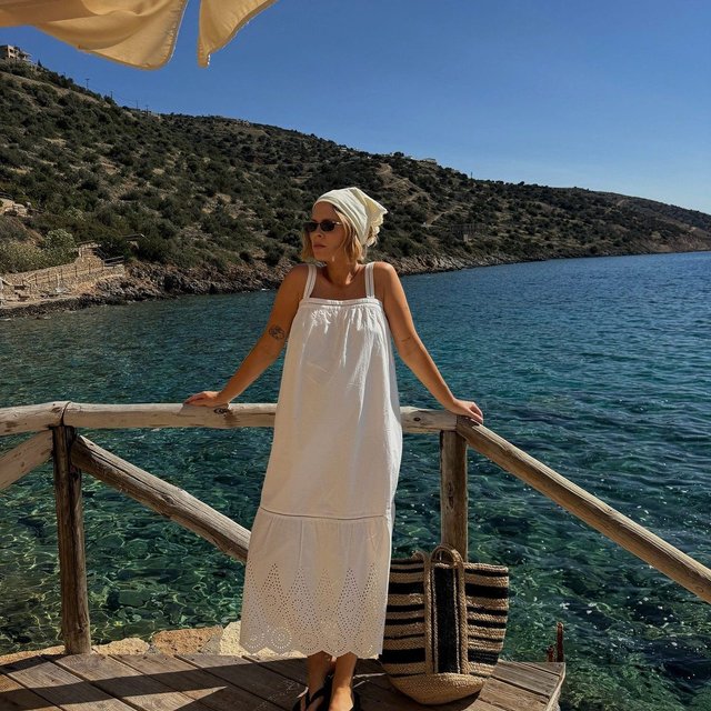 @jessie_bush looks dreamy in our detailed Broderie Anglaise Midi Dress on holiday. 🤍