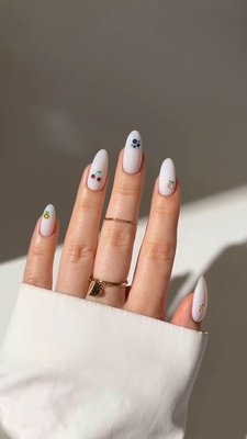These fruity nails from @heygreatnails are so ready for summer 🍋🍒🫐🍑 Save as inspo for your next nail appointment 💅