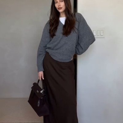 @jourdansloane styles our Wool V Neck Sweater and Silk Maxi Skirt