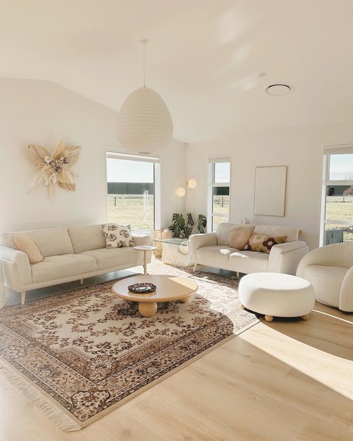 Resharing a pic of this space as these sofas and the rug are in quite a state thanks to kids snacks (snacks are life) and need to be deep cleaned. This was taken last June (although actually looks much the same!) on the day our house was photographed for a magazine. Hasn’t been featured in the magazine yet but hopefully still happening one day 😬 

Our home is not super flashy architecturally but what you can’t see is the investment we made in high spec windows, deeper external walls for extra insulation, double layer insulation in the ceiling, insulated foundation, ducted heat pump and ventilation system, solar hot water - so that we have a warm dry healthy home for life, that has minimal ongoing cost. We have a 7 star Homestar healthy home rating. Our home is cool in summer and warm in winter, without much need for the heating or cooling system except on extreme days. It’s such a good way to build and I’m happy to help answer any questions (I worked for the builder who built our home) 🏡