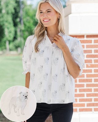 Sweet, spirited, and ready for kickoff 🐶🤍 This white bulldog print blouse brings playful charm and classic game day pride to your look!

>> Can't Give You Up White Bulldog Print Blouse

#shopthemint #boutique #onlineshopping #styledaily #getthelook #everydayfashion #gameday #gamedayoutfit #SEC #fridaynightlights
