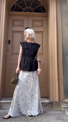 @emmasnowdonstyle looks effortlessly chic in our new Clover Tie Waistcoat and Josie Eco Ennis Skirt. 🤍