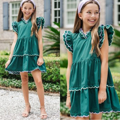 A fall favorite 💚🍂✨ Sweet scalloped details and a playful fit make it perfect for crisp days, family photos, and every little moment she’ll treasure 🎀

$56 >> Girls: Memories Are Forever Green Scalloped Dress