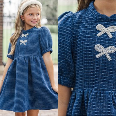 Classic with a touch of sparkle 💙 This navy tweed dress with delicate embellishments brings timeless charm and polished style to her fall wardrobe.

$50 >> Girls: The Gwen Navy Blue Embellished Tweed Dress