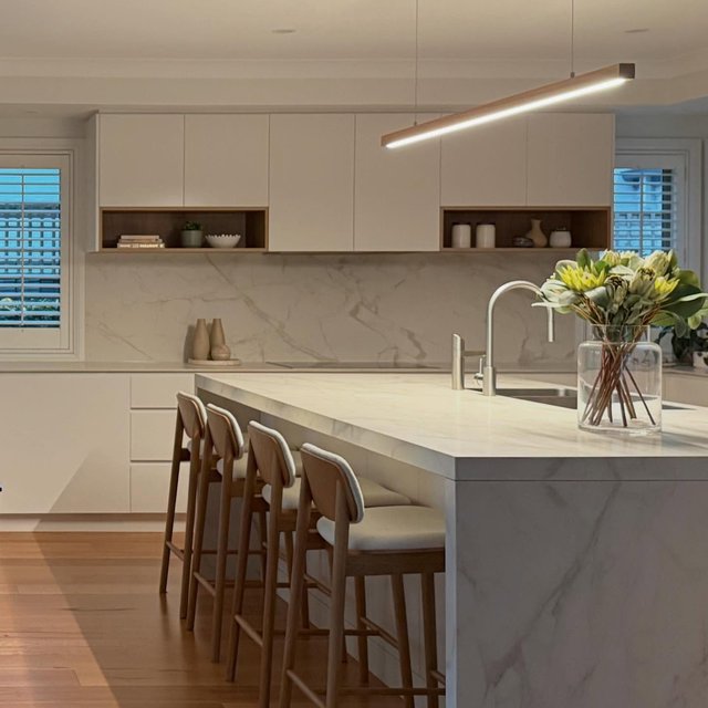 THE HAMPTON PROJECT | KITCHEN

Modern & Minimal 〰️ thoughtfully designed with a classic touch. Timber accents paired with duluxaus Whitsunday Island cabinetry. My clients brief was an all white kitchen with clean lines.

➡️ SWIPE FOR BEFORE & AFTER 

Designed by: sammie_ltki 
Built by: letstalkkitchensandinteriors 

Benchtop & Splashback: ‘Ascale’ Vagli Gold
Cabinetry: ‘Dulux’ Whitsunday Island
Cabinetry accents: ‘Polytec’ Boston Oak
Pendant: ‘About Space’ 2BY5 linear pendant
Bar stools: ‘Freedom’ Lubbeek bar stools

#kitchendesign #interiordesign #kitchenrenovation #joinery #bespokecabinetry #customdesigns #custombuilder #modern #minimal #melbournedesign #melbourne