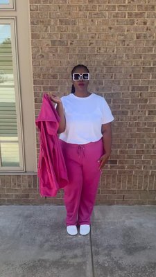 On Wednesdays, we bring the heat in pink! 💖🔥 @whatsthatlippie is serving looks with the coziest combo: Better Fleece Zip-Front Hoodie, Sport Knit Straight Leg Pant, and the Perfect Short-Sleeve Crewneck Tee! Who’s ready to slay the midweek slump? #WomanWithin #stylegoals