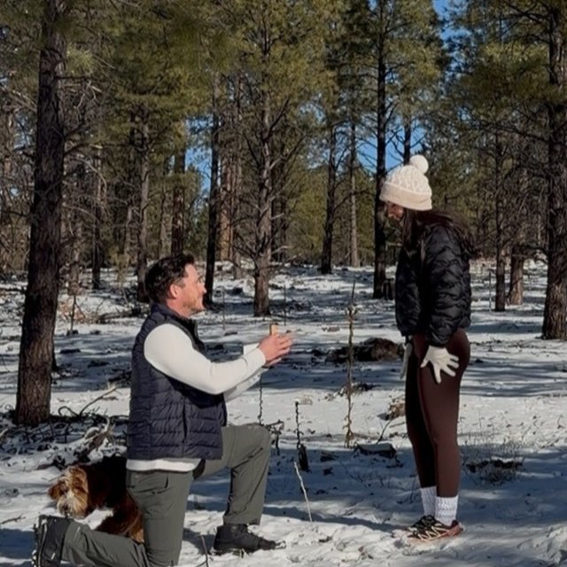 Adding “snowy proposal” to the vision board ❄️ Congrats to @cynthiacchavez and @adamwolfefitness on your engagement. The details: 18K Yellow Gold Audrey Perfect Fit Hidden Halo 2mm Diamond Ring set with an Oval Diamond